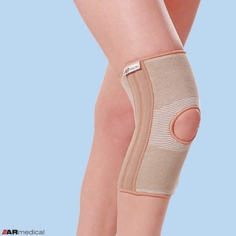 Tkaninowa orteza stawu kolanowego ze wzmocnieniami i otworem na rzepkę, wciągana SP 871